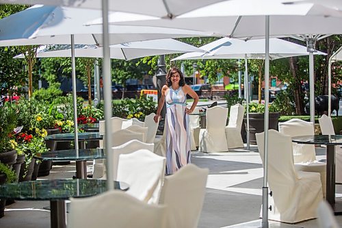 MIKAELA MACKENZIE / WINNIPEG FREE PRESS

Ida Albo, general manager of the Fort Garry Hotel, poses for a portrait on the new Sunset Terrace and Bar today, a first-ever patio for the historic hotel, in Winnipeg on Wednesday, June 30, 2021. For JS story.
Winnipeg Free Press 2021.