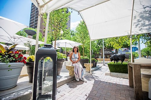 MIKAELA MACKENZIE / WINNIPEG FREE PRESS

Ida Albo, general manager of the Fort Garry Hotel, poses for a portrait on the new Sunset Terrace and Bar today, a first-ever patio for the historic hotel, in Winnipeg on Wednesday, June 30, 2021. For JS story.
Winnipeg Free Press 2021.