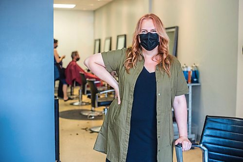 MIKAELA MACKENZIE / WINNIPEG FREE PRESS

Eve Rice, hairstylist, poses for a portrait in Winnipeg on Wednesday, June 30, 2021. As second doses ramp up in MB, some workers are taking being fully immunized as a way to be competitive with prospective clients. For Malak story.
Winnipeg Free Press 2021.