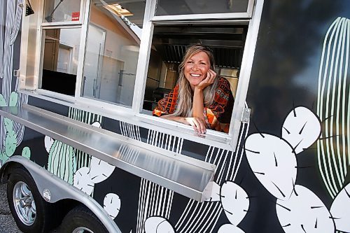 JOHN WOODS / WINNIPEG FREE PRESS
Erin Popoff, a former WestJet pilot laid off because of the pandemic, is photographed with her new food truck trailer, Poacht, outside her home in Winnipeg Wednesday, June 30, 2021. Popoff launched the pandemic pivot small business to make up for being let go by WestJet.

Reporter: Durrani