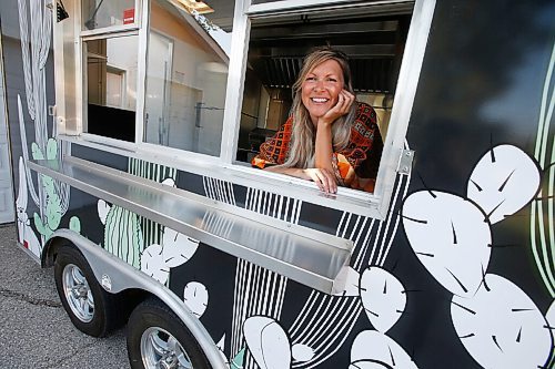 JOHN WOODS / WINNIPEG FREE PRESS
Erin Popoff, a former WestJet pilot laid off because of the pandemic, is photographed with her new food truck trailer, Poacht, outside her home in Winnipeg Wednesday, June 30, 2021. Popoff launched the pandemic pivot small business to make up for being let go by WestJet.

Reporter: Durrani