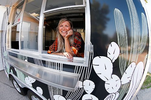 JOHN WOODS / WINNIPEG FREE PRESS
Erin Popoff, a former WestJet pilot laid off because of the pandemic, is photographed with her new food truck trailer, Poacht, outside her home in Winnipeg Wednesday, June 30, 2021. Popoff launched the pandemic pivot small business to make up for being let go by WestJet.

Reporter: Durrani