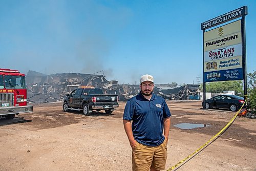 ALEX LUPUL / WINNIPEG FREE PRESS  

Joey Walker, owner of Pool Pros, poses for a portrait outside of the charred structure of his business on Thursday, July 1, 2021. The cause of the blaze has yet to be determined.