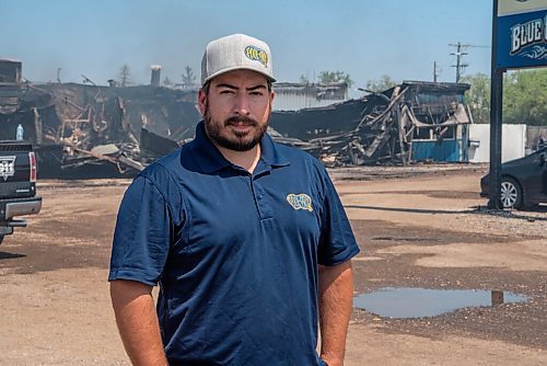 ALEX LUPUL / WINNIPEG FREE PRESS  

Joey Walker, owner of Pool Pros, poses for a portrait outside of the charred structure of his business on Thursday, July 1, 2021. The cause of the blaze has yet to be determined.