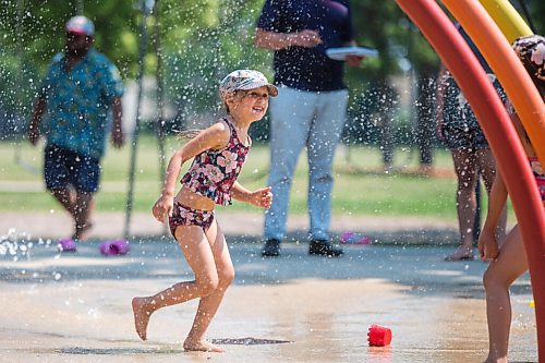 MIKAELA MACKENZIE / WINNIPEG FREE PRESS

Sula Fiorante (six) keeps cool at the Provencher Park splash pad in Winnipeg on Friday, July 2, 2021. For Cody story.
Winnipeg Free Press 2021.