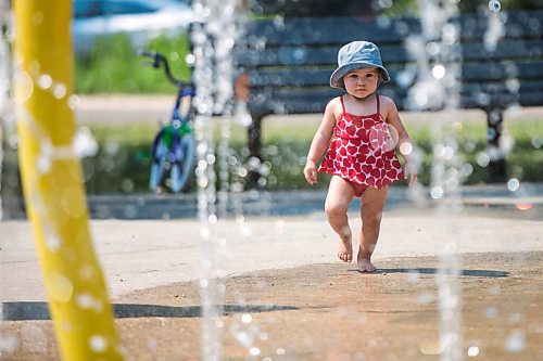 MIKAELA MACKENZIE / WINNIPEG FREE PRESS

One-year-old London Malegus explores the water features for the first time at the Provencher Park splash pad in Winnipeg on Friday, July 2, 2021. For Cody story.
Winnipeg Free Press 2021.