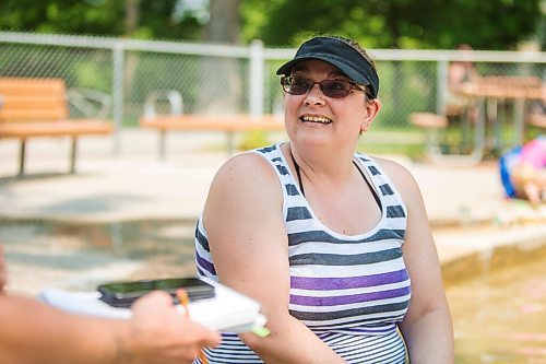 MIKAELA MACKENZIE / WINNIPEG FREE PRESS

Jamie Haluik deals with the heat wave by going to the Elmwood Park wading pool in Winnipeg on Friday, July 2, 2021. For Cody story.
Winnipeg Free Press 2021.