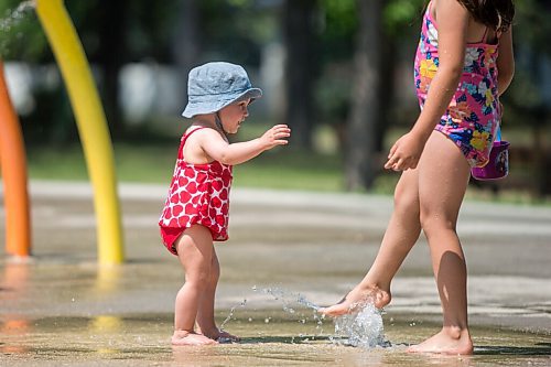 MIKAELA MACKENZIE / WINNIPEG FREE PRESS

One-year-old London Malegus explores the water features for the first time at the Provencher Park splash pad in Winnipeg on Friday, July 2, 2021. For Cody story.
Winnipeg Free Press 2021.