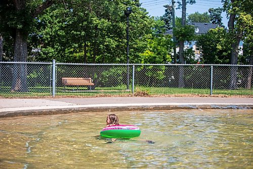 MIKAELA MACKENZIE / WINNIPEG FREE PRESS

Paige Haluik (9) deals with the heat wave by swimming in the Elmwood Park wading pool in Winnipeg on Friday, July 2, 2021. For Cody story.
Winnipeg Free Press 2021.