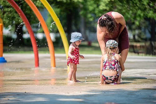 MIKAELA MACKENZIE / WINNIPEG FREE PRESS

One-year-old London Malegus explores the water features for the first time with her mom, Sydney Godbout, at the Provencher Park splash pad in Winnipeg on Friday, July 2, 2021. For Cody story.
Winnipeg Free Press 2021.