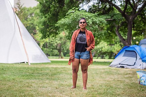 MIKAELA MACKENZIE / WINNIPEG FREE PRESS

Aaliyah Leach, coordinator, poses for a portrait at the sacred fire and healing village on the Legislative grounds in Winnipeg on Monday, July 5, 2021. For Carol Sanders story.
Winnipeg Free Press 2021.