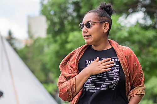 MIKAELA MACKENZIE / WINNIPEG FREE PRESS

Aaliyah Leach, coordinator, poses for a portrait at the sacred fire and healing village on the Legislative grounds in Winnipeg on Monday, July 5, 2021. For Carol Sanders story.
Winnipeg Free Press 2021.