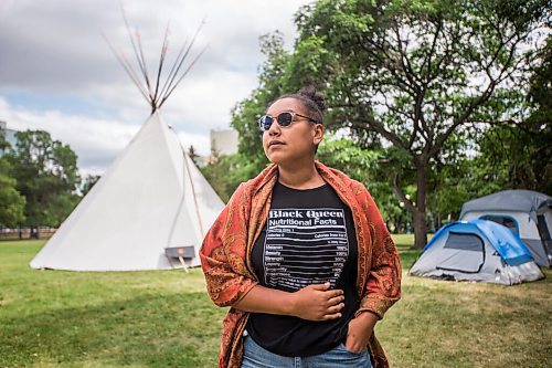 MIKAELA MACKENZIE / WINNIPEG FREE PRESS

Aaliyah Leach, coordinator, poses for a portrait at the sacred fire and healing village on the Legislative grounds in Winnipeg on Monday, July 5, 2021. For Carol Sanders story.
Winnipeg Free Press 2021.