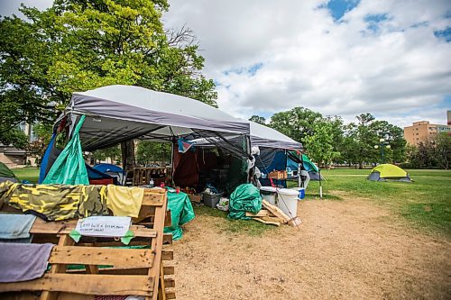 MIKAELA MACKENZIE / WINNIPEG FREE PRESS

The food and water tents at the sacred fire and healing village on the Legislative grounds in Winnipeg on Monday, July 5, 2021. For Carol Sanders story.
Winnipeg Free Press 2021.