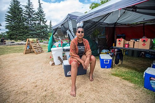 MIKAELA MACKENZIE / WINNIPEG FREE PRESS

Aaliyah Leach, coordinator, poses for a portrait at the sacred fire and healing village on the Legislative grounds in Winnipeg on Monday, July 5, 2021. For Carol Sanders story.
Winnipeg Free Press 2021.