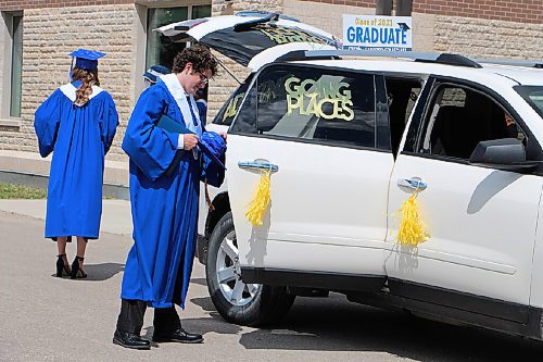 Canstar Community News Adam Cox gets ready to leave his Grade 12 graduation. Each senior had a time slot to receive their diploma and take pictures before the next family arrived. (GABRIELLE PICHÉ/CANSTAR COMMUNITY NEWS/HEADLINER)