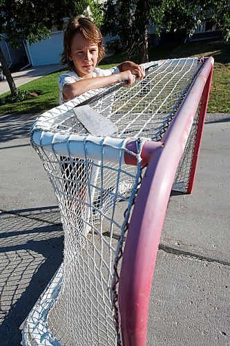 JOHN WOODS / WINNIPEG FREE PRESS
Ryden Leronowich, 10, a Grade 4 student is photographed outside his home in Winnipeg Monday, July 5, 2021. Leronowich contributed a piece of poetry about his love for hockey and missing the sport during COVID-19 to an anthology, Apart, Yet Together, which will be distributed by the Seven Oaks School Division.

Reporter: MacIntosh