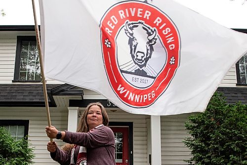ALEX LUPUL / WINNIPEG FREE PRESS  

Nicky Cottee, president of the Valour FC fan club Red River Rising, poses for a portrait at her Winnipeg home on Tuesday, July 6, 2021. The Canadian Premier League will welcome 2,000 fans to IG field starting Wednesday.

Reporter: Taylor Allen