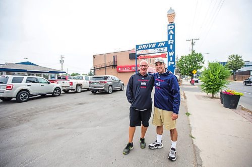 MIKAELA MACKENZIE / WINNIPEG FREE PRESS

Cousins Trif (left) and Dean Lambos pose for a portrait in front of the Dairi-Wip Drive In, one of the more iconic burger joints in town, in Winnipeg on Tuesday, July 6, 2021. For Dave Sanderson story.
Winnipeg Free Press 2021.