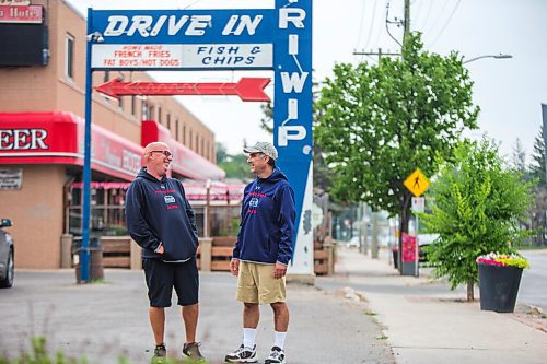 MIKAELA MACKENZIE / WINNIPEG FREE PRESS

Cousins Trif (left) and Dean Lambos pose for a portrait in front of the Dairi-Wip Drive In, one of the more iconic burger joints in town, in Winnipeg on Tuesday, July 6, 2021. For Dave Sanderson story.
Winnipeg Free Press 2021.