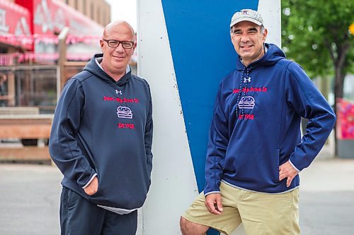 MIKAELA MACKENZIE / WINNIPEG FREE PRESS

Cousins Trif (left) and Dean Lambos pose for a portrait in front of the Dairi-Wip Drive In, one of the more iconic burger joints in town, in Winnipeg on Tuesday, July 6, 2021. For Dave Sanderson story.
Winnipeg Free Press 2021.