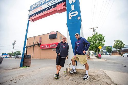 MIKAELA MACKENZIE / WINNIPEG FREE PRESS

Cousins Trif (left) and Dean Lambos pose for a portrait in front of the Dairi-Wip Drive In, one of the more iconic burger joints in town, in Winnipeg on Tuesday, July 6, 2021. For Dave Sanderson story.
Winnipeg Free Press 2021.