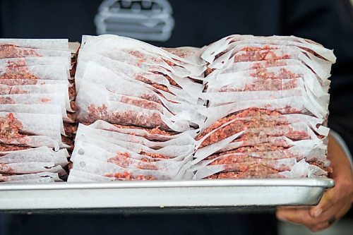 MIKAELA MACKENZIE / WINNIPEG FREE PRESS

A tray full of burgers, ready to be grilled up, at the Dairi-Wip Drive In, one of the more iconic burger joints in town, in Winnipeg on Tuesday, July 6, 2021. For Dave Sanderson story.
Winnipeg Free Press 2021.