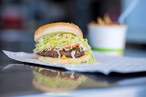 MIKAELA MACKENZIE / WINNIPEG FREE PRESS

A burger at the Dairi-Wip Drive In, one of the more iconic burger joints in town, in Winnipeg on Tuesday, July 6, 2021. For Dave Sanderson story.
Winnipeg Free Press 2021.