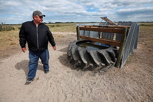 JOHN WOODS / WINNIPEG FREE PRESS
Tom Johnson, a cattle farmer, tends to a new well he has installed for his cattle on his farm near Oak Point north of Winnipeg Tuesday, July 6, 2021. Johnson and other farmers north of Winnipeg are experiencing draught conditions.

Reporter: Pindera