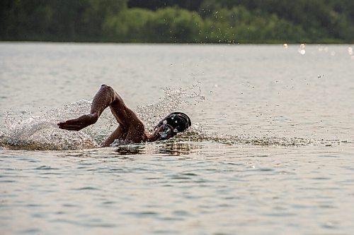 MIKE SUDOMA / WINNIPEG FREE PRESS
Triathlete, Blake Harris, finishes up a lap during a Triathlon Manitoba practice in Birds Hill Park Tuesday evening
July 6, 2021