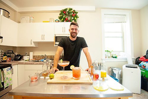 MIKE SUDOMA / Winnipeg Free Press
Bartender, Scott Redfern, shows off two new summer cocktail creations, the Summer Rose (left) and the Summer Garden at his home Wednesday afternoon
July 7, 2021