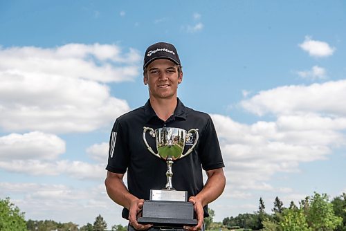 ALEX LUPUL / WINNIPEG FREE PRESS  

Braxton Kuntz poses for a portrait with the Junior Men's Championship trophy he won at the Shilo Country Club in Shilo on Wednesday, July 7, 2021.

Reporter: Joseph Bernacki