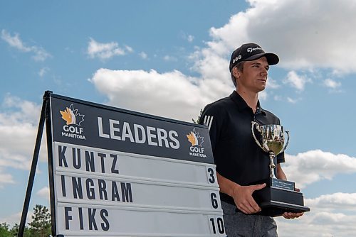 ALEX LUPUL / WINNIPEG FREE PRESS  

Braxton Kuntz poses for a portrait with the Junior Men's Championship trophy he won at the Shilo Country Club in Shilo on Wednesday, July 7, 2021.

Reporter: Joseph Bernacki