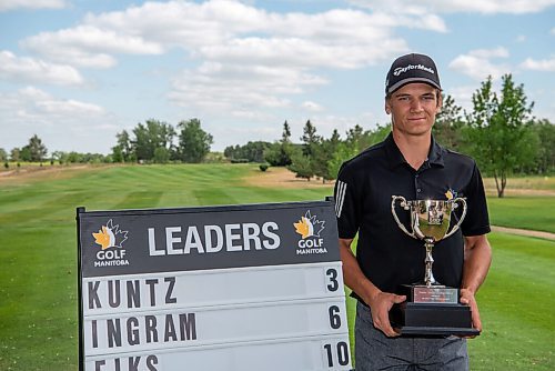 ALEX LUPUL / WINNIPEG FREE PRESS  

Braxton Kuntz poses for a portrait with the Junior Men's Championship trophy he won at the Shilo Country Club in Shilo on Wednesday, July 7, 2021.

Reporter: Joseph Bernacki