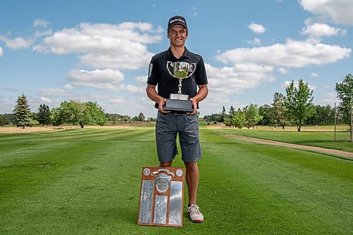 ALEX LUPUL / WINNIPEG FREE PRESS  

Braxton Kuntz poses for a portrait with the Junior Men's Championship trophy he won at the Shilo Country Club in Shilo on Wednesday, July 7, 2021.

Reporter: Joseph Bernacki