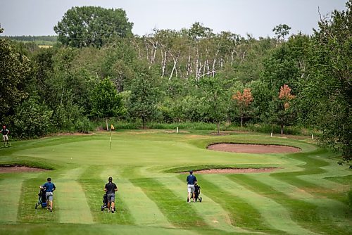 ALEX LUPUL / WINNIPEG FREE PRESS  

From left, Jordon McDonald, Braxton Kuntz and Ryan Blair walk down the fairway together at the Golf Manitoba Junior Men's Championship at the Shilo Country Club in Shilo on Wednesday, July 7, 2021.

Reporter: Joseph Bernacki