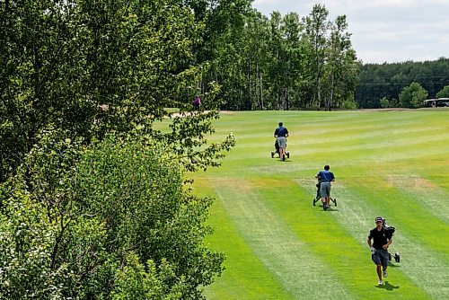 ALEX LUPUL / WINNIPEG FREE PRESS  

From left, Ryan Blair, Jordon McDonald, and Braxton Kuntz walk down the 15th fairway together at the Golf Manitoba Junior Men's Championship at the Shilo Country Club in Shilo on Wednesday, July 7, 2021.

Reporter: Joseph Bernacki