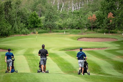 ALEX LUPUL / WINNIPEG FREE PRESS  

From left, Jordon McDonald, Braxton Kuntz and Ryan Blair walk down the fairway together at the Golf Manitoba Junior Men's Championship at the Shilo Country Club in Shilo on Wednesday, July 7, 2021.

Reporter: Joseph Bernacki