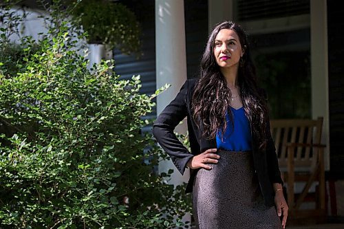 MIKAELA MACKENZIE / WINNIPEG FREE PRESS

Joëlle Pastora Sala, lawyer and advocate with the Public Interest Law Centre, poses for a portrait in her front yard in Winnipeg on Wednesday, July 7, 2021. For Erik Pindera story.
Winnipeg Free Press 2021.