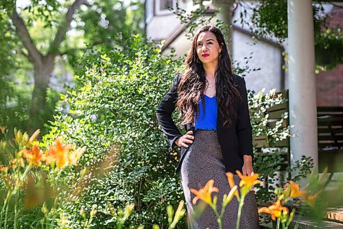 MIKAELA MACKENZIE / WINNIPEG FREE PRESS

Joëlle Pastora Sala, lawyer and advocate with the Public Interest Law Centre, poses for a portrait in her front yard in Winnipeg on Wednesday, July 7, 2021. For Erik Pindera story.
Winnipeg Free Press 2021.