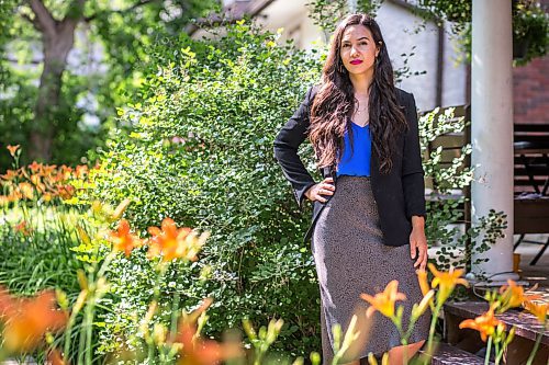 MIKAELA MACKENZIE / WINNIPEG FREE PRESS

Joëlle Pastora Sala, lawyer and advocate with the Public Interest Law Centre, poses for a portrait in her front yard in Winnipeg on Wednesday, July 7, 2021. For Erik Pindera story.
Winnipeg Free Press 2021.