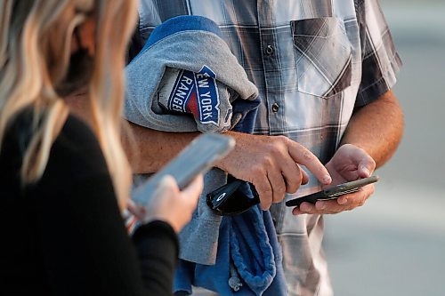 JOHN WOODS / WINNIPEG FREE PRESS
Valour football fans line up to get their vaccination cards/QR codes scanned before they enter the stadium in Winnipeg Wednesday, July 7, 2021.

Reporter: ?