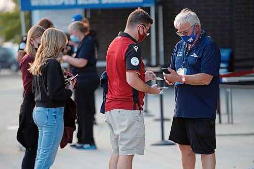 JOHN WOODS / WINNIPEG FREE PRESS
Valour football fans line up to get their vaccination cards/QR codes scanned before they enter the stadium in Winnipeg Wednesday, July 7, 2021.

Reporter: ?