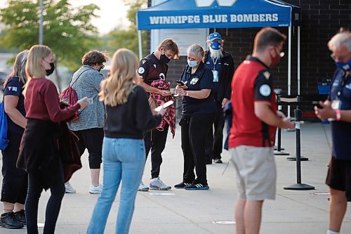 JOHN WOODS / WINNIPEG FREE PRESS
Valour football fans line up to get their vaccination cards/QR codes scanned before they enter the stadium in Winnipeg Wednesday, July 7, 2021.

Reporter: ?