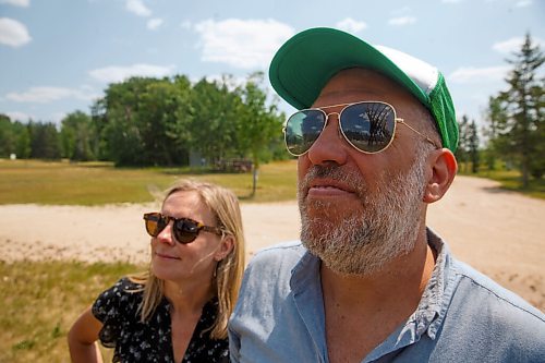 MIKE DEAL / WINNIPEG FREE PRESS
Festival Tower is reflected in Artistic Director Chris Frayer's sunglasses while on a tour at the Folk Festival site in Birdshill Provincial Park.
See Ben Waldman story
210707 - Wednesday, July 07, 2021.