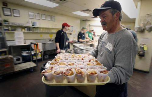 MIKE.DEAL@FREEPRESS.MB.CA 100402 - Friday, April 2nd, 2010 Volunteer Larry J. Dick works hard to get the Easter Dinner ready for Winnipeg's poor and homeless on Friday. The dinner goes from Noon to 2:30pm on Friday and 3pm to 5pm on Sunday. MIKE DEAL / WINNIPEG FREE PRESS