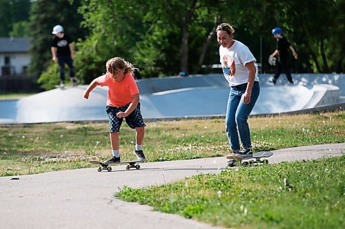JOHN WOODS / WINNIPEG FREE PRESS
Jaimie Isaac and her son James skateboard at Chornick Park in Winnipeg Thursday, July 8, 2021. Isaac, a curator at the Winnipeg Art Gallery, curated an art show, Boarder X, which presented contemporary work by artists from indigenous communities across Canada who surf, skate and snowboard. Isaac used to skate this park when she was a child.

Reporter: Sabrina