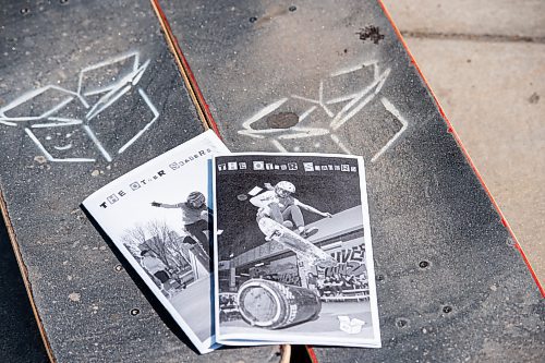 MIKE SUDOMA / WINNIPEG FREE PRESS

Copies of Maddy Nowasad’s and Emilie Rafnson’s zine, “The Other Skaters” sit atop their skateboards with he zine’s logo spray painted onto their grip tape at Riverbend Skatepark Wednesday afternoon

July 7, 2021