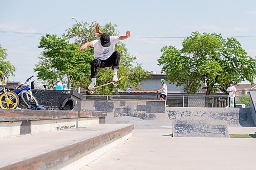 MIKE SUDOMA / WINNIPEG FREE PRESS

Local skateboarder, Emilie Rafnson, ollies over the big two stair during a session with her partner, Maddy Nowasad at Riverbend Skatepark Wednesday afternoon

July 7, 2021