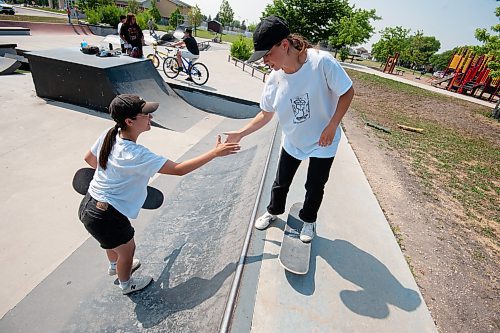 MIKE SUDOMA / WINNIPEG FREE PRESS

(Left to Right) Maddy Nowasad and Emilie Rafnson share a moment as they take a break whiles skateboarding at Riverbend Skatepark Wednesday afternoon. 

July 7, 2021